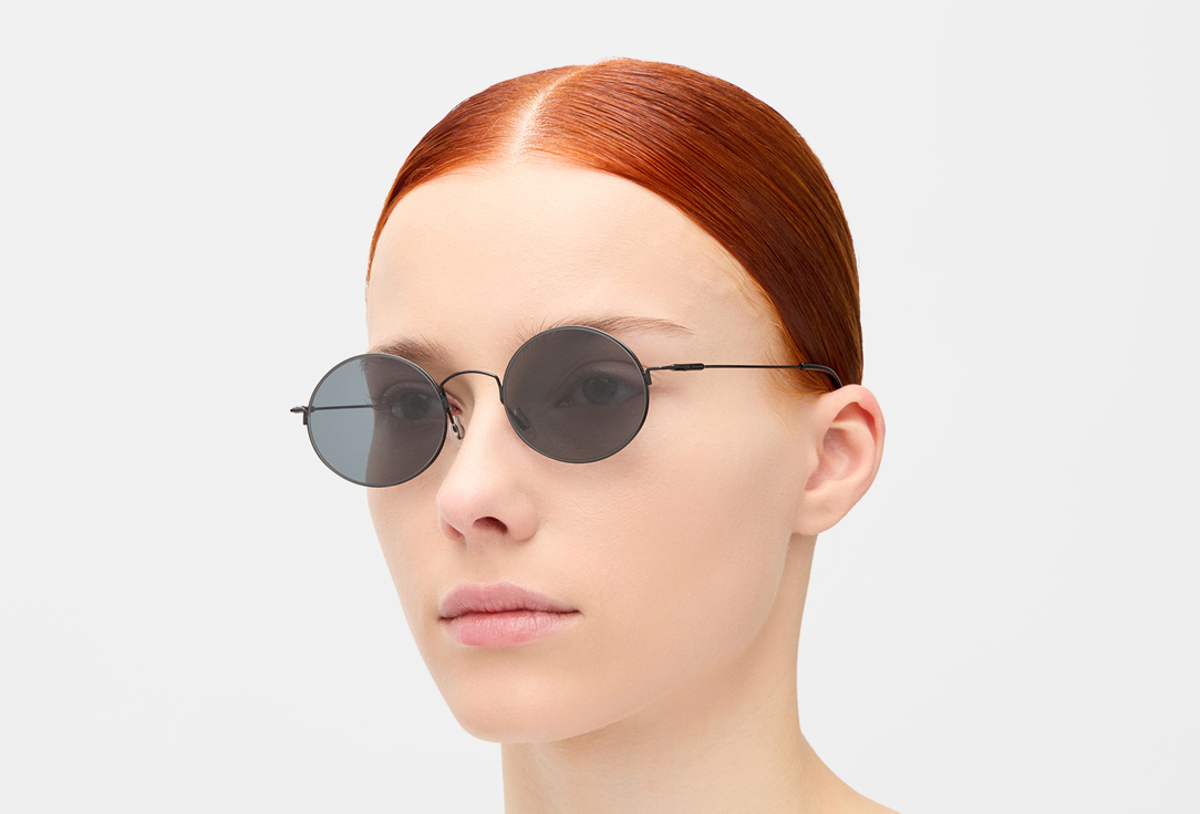 Изображение товара Солнцезащитные очки RUXARA круглые черные - стильный аксессуар и защита глаз